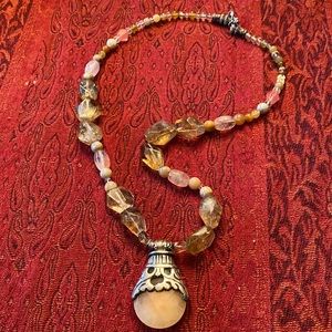 Pink quartz and silver pendant with semi precious stones.